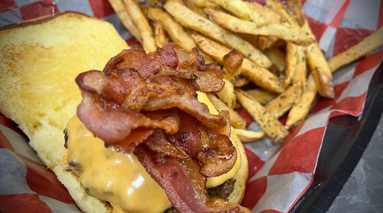Roots Burgers & Fries is one of six vendors inside The Social at Piqua Center. NATALIE JONES/STAFF