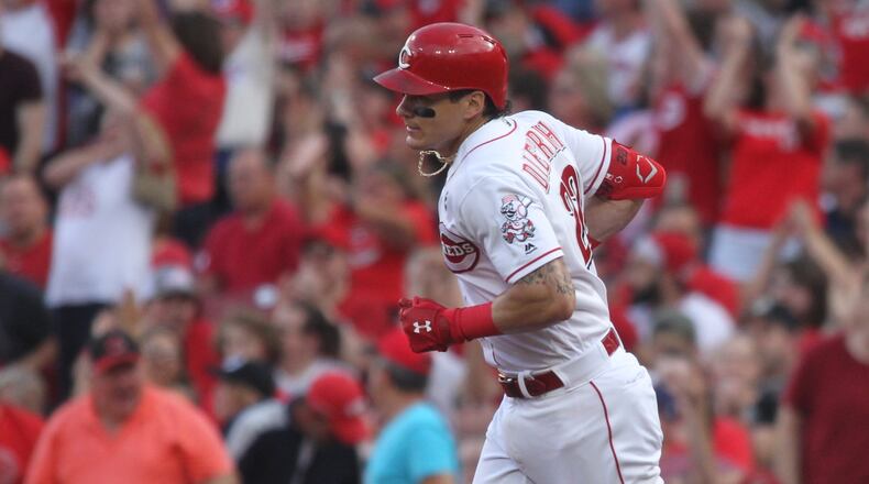 The Reds’ Derek Dietrich rounds the bases after a home run against the Astros on June 18, 2019, at Great American Ball Park in Cincinnati. David Jablonski/Staff
