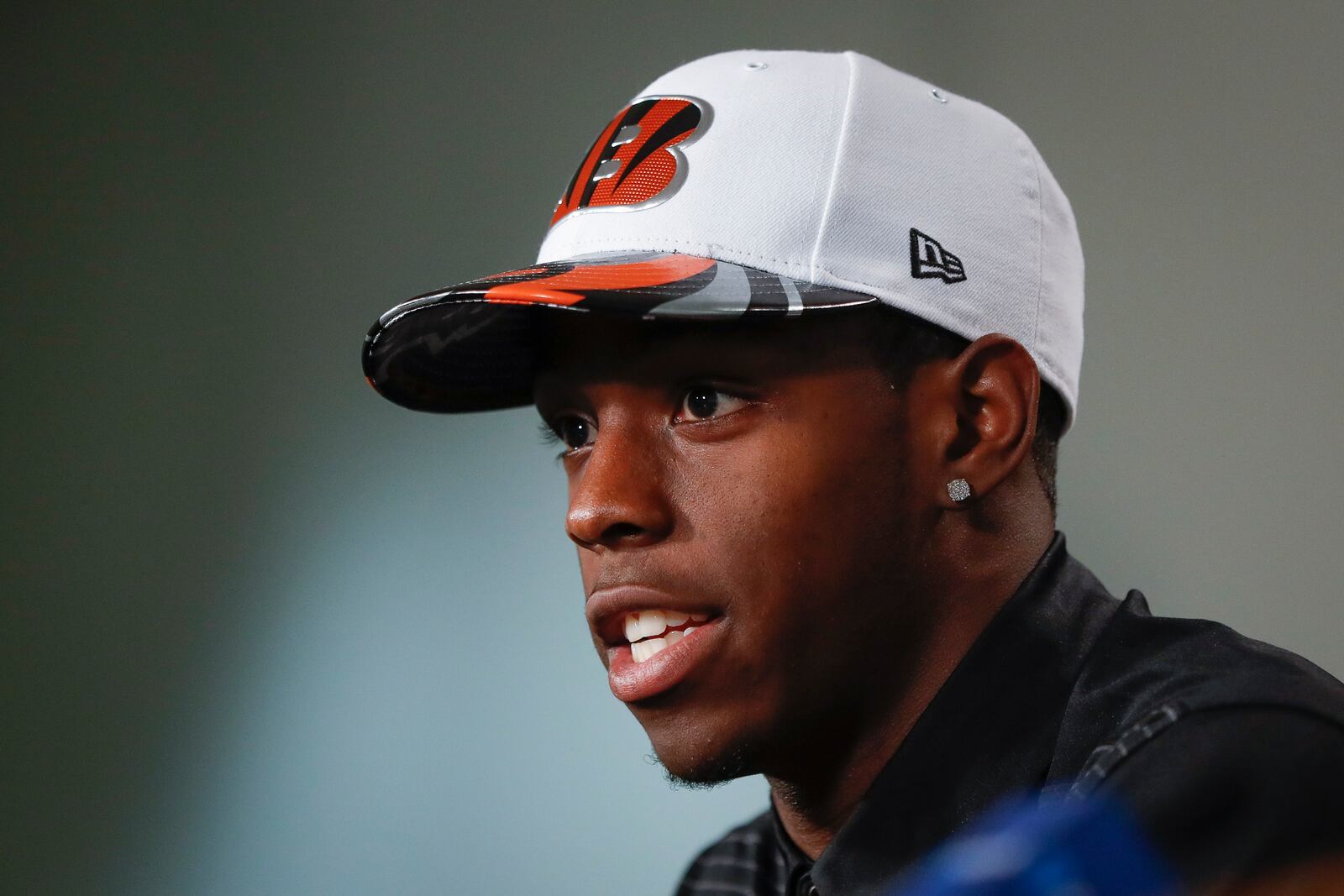 The Cincinnati Bengals first-round draft pick John Ross is interviewed during an NFL football news conference at Paul Brown Stadium, Friday, April 28, 2017, in Cincinnati. The former University of Washington wide receiver was selected as the ninth overall pick. (AP Photo/John Minchillo)