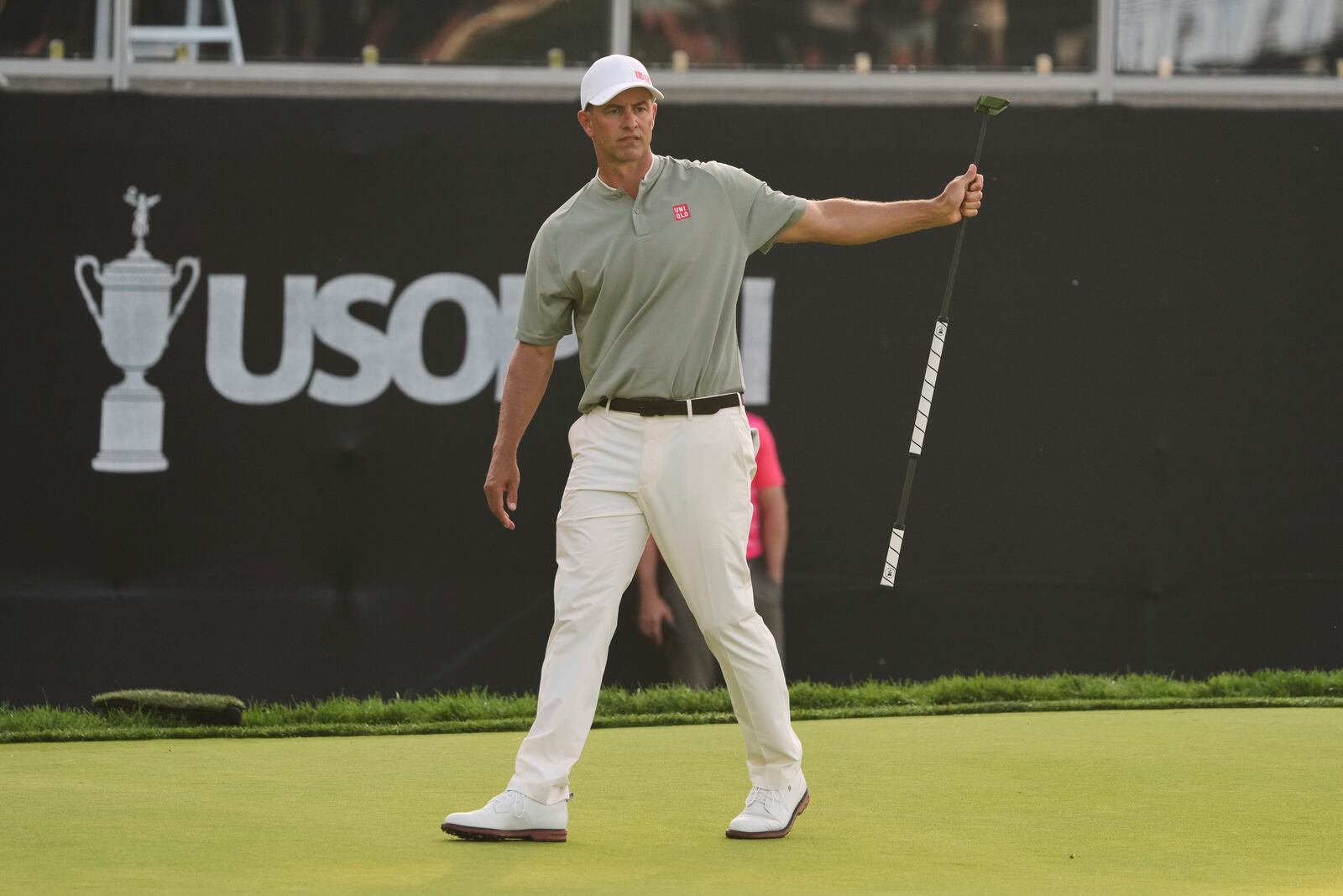 Adam Scott, of Australia, reacts to missing a putt on the 18th hole during the third round of the U.S. Open golf tournament at Oakmont Country Club Saturday, June 14, 2025, in Oakmont, Pa. (AP Photo/Gene J. Puskar)