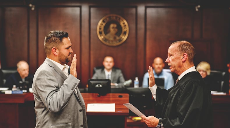 Ryan Roberts, the top vote-getter in the five-way Franklin City Council race for three open seats is sworn in Monday, Nov. 10, 2025, by Franklin Judge Ronald Ruppert to fill the unexpired term of longtime Councilman Denny Centers who resigned in September after 25 years of service. CONTRIBUTED