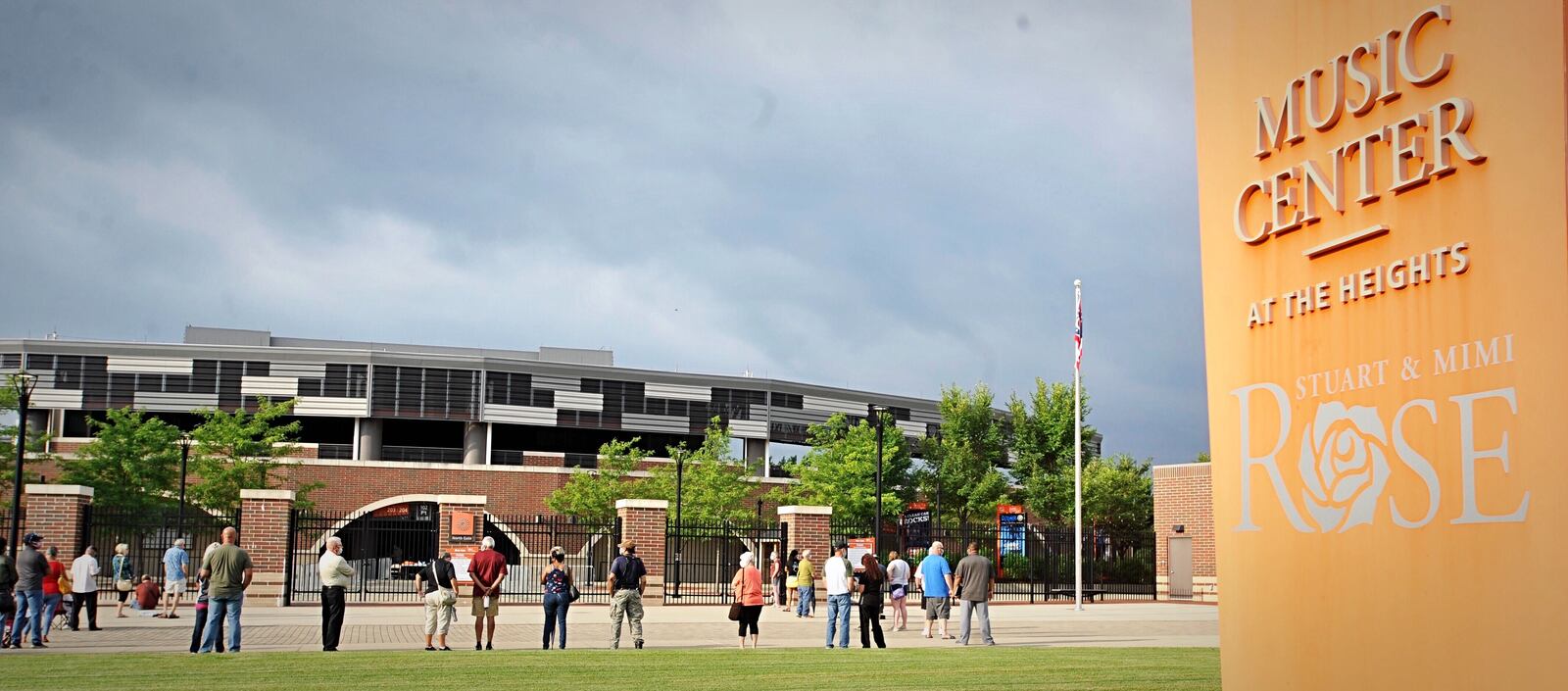 People were lined up outside of the Rose Music Center in Huber Heights Thursday morning ahead of free coronavirus testing. STAFF PHOTO / MARSHALL GORBY