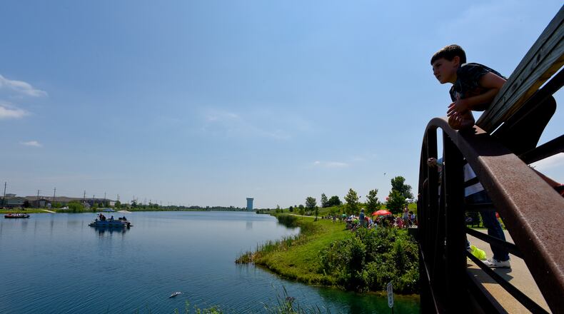More than 1,000 flags will encircle the lake at Voice of America MetroPark on Thursday as part of an event celebrating cultural diversity by Miami University Regionals’ English Language Center. STAFF FILE PHOTO