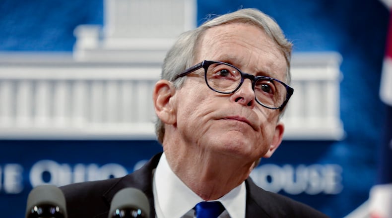 FILE - In this file photo from Aug. 6, 2019, Ohio Gov. Mike DeWine pauses while speaking at the Ohio Statehouse in Columbus, Ohio. DeWine is ready to unveil his upcoming state budget Monday, Feb. 1, 2021, with proposals to fund everything from schools, public colleges and universities, health care for poor children and families, and prison operations. This is the Republican governor's second budget proposal but the first to reflect revenue downturns caused by the coronavirus pandemic. (Joshua A. Bickel/The Columbus Dispatch via AP, File)