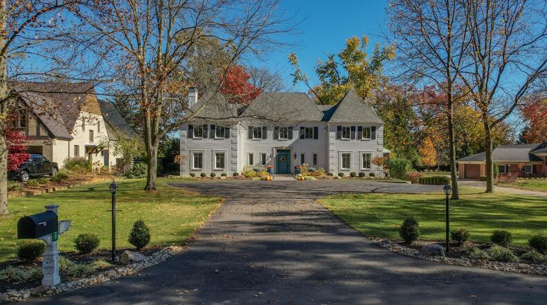 The front of the home has a circular asphalt driveway that leads to pavers connected to a solid limestone front step. Contributed photos