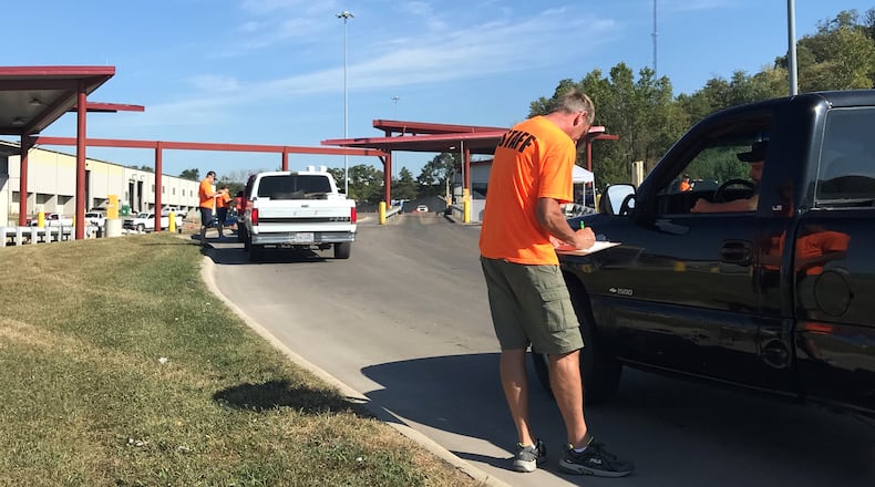 A Montgomery County employee checks in a citizen at a recent Tire Buyback event in 2021. FILE