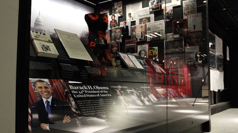 In this photo taken July 18, 2016, an exhibit depicting the presidency and the life of President Barack Obama and his family is seen during a media preview tour at the Smithsonian National Museum of African American History and Culture in Washington. The museum’s grand opening will be on Sept. 24. (AP Photo/Paul Holston)