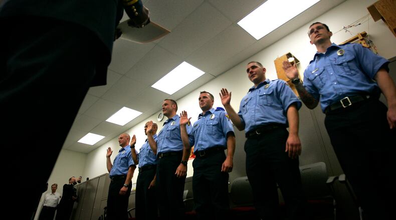 Graduates are sworn in by Fire Chief Herbert Redden at Dayton Fire Department’s Paramedic Graduation ceremony at the Fire Training Center, 200 McFadden Avenue, on Friday, June 17th, 2011. Staff Photo by Jim Witmer