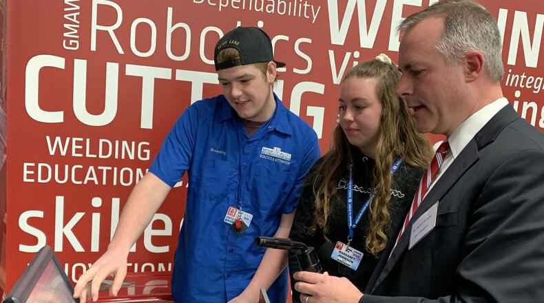 Ohio’s Treasure of State, Robert Sprague, joined administrators and students from the Miami Valley Career Technology Center for a roundtable discussion on the impact of career technical education in Ohio and students’ financial futures. STAFF/WAYNE BAKER