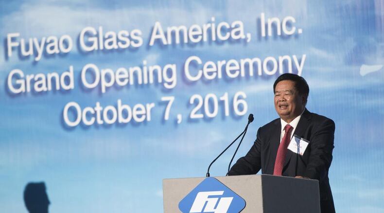 Cho Tak Wong, chairman of Fuyao Group, at the grand opening of the Fuyao Glass America Moraine plant in October 2016. AP Photo/John Minchillo