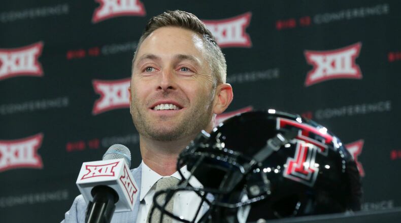 Texas Tech head football coach Cliff Kingsbury listens to a reporter's question during the Big 12 NCAA college football media day in Frisco, Texas, Monday, July 17, 2017. (AP Photo/LM Otero)
