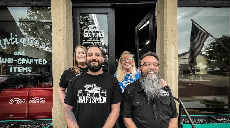 From left, Jessica Popejoy, Jeff Popejoy, Kathy Stanze and Darren Stanze all own the Simple Craftsmen a store in Miamisburg that builds and restores furniture. JIM NOELKER/STAFF