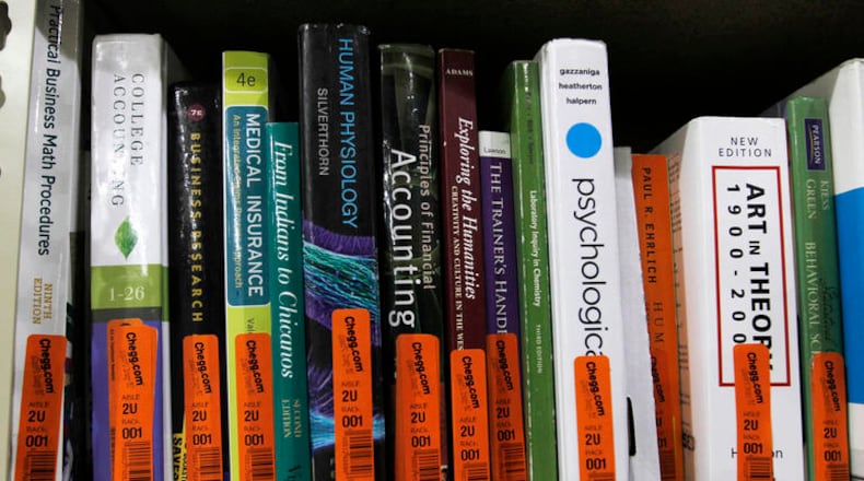 Textbooks sit on a shelf at the Chegg Inc. warehouse in Shepherdsville, Kentucky, U.S., on Thursday, April 29, 2010. No more $120 chemistry books. That’s the message from textbook-rental service Chegg Inc., which is urging college students to stop paying top dollar to buy their tomes. Photographer: John Sommers II/Bloomberg via Getty Images