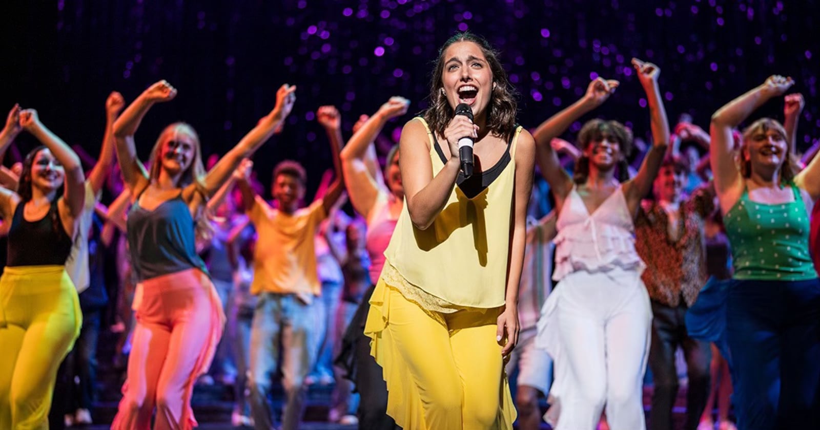 Muse Machine alumna Maggie Weckesser sings "Walking on Sunshine" in the Muse Machine's "Dancing in the Moonlight" concert. MUSE MACHINE