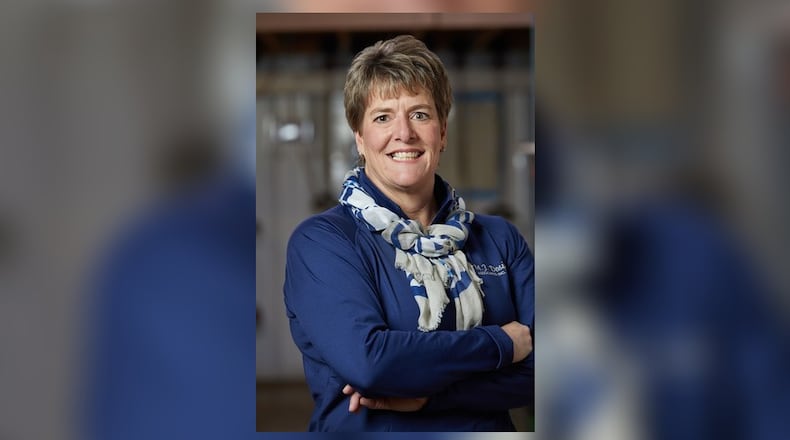 Molly Marie John is the president of the Ohio Green Industry Association and Vice President and CEO of M.J. Design Associates, Inc.