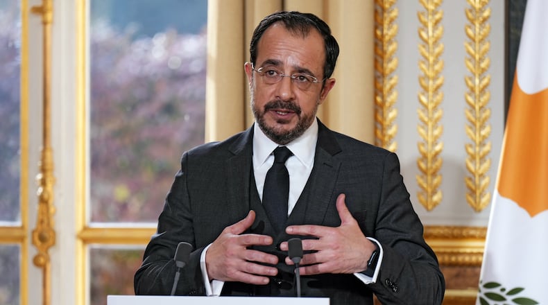 Cyprus' President Nikos Christodoulides delivers a speech during a press conference following his meeting with French President Emmanuel Macron at the Elysee Palace, Monday Dec. 15, 2025 in Paris. (Dimitar Dilkoff, Pool photo via AP)