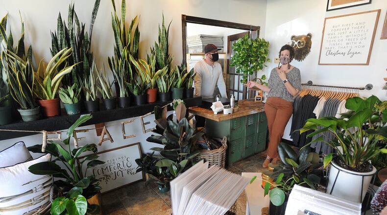 Ryan and Courtney Hart talk about their newly opened plant and home shop, Ivy Count in Clayton. It is the couples second location. MARSHALL GORBY\STAFF
