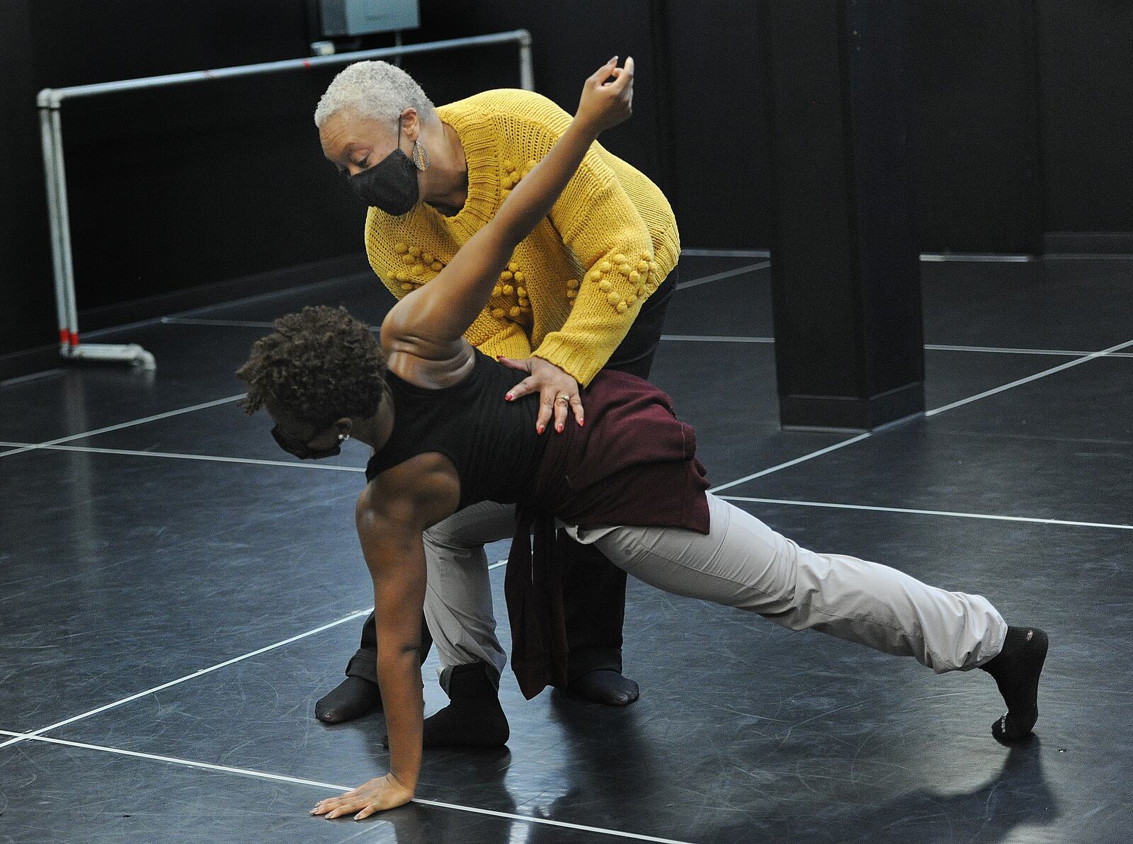 Dayton Contemporary Dance Company Chief Artistic and Producing Director Debbie Blunden-Diggs works with the company dancers Thursday Feb. 10, 2022. MARSHALL GORBY\STAFF