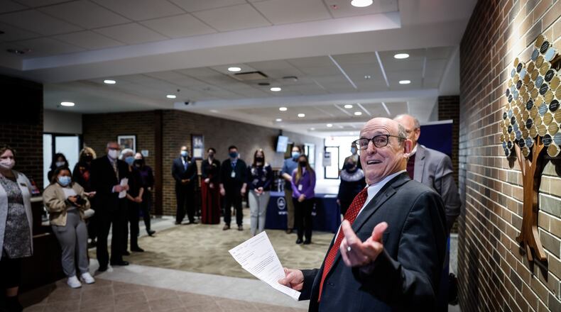 United Theological Seminary President, Kent Millard talks to a small crowd at the school Monday Jan. 10 celebrating the schools 150 year anniversary. JIM NOELKER/STAFF