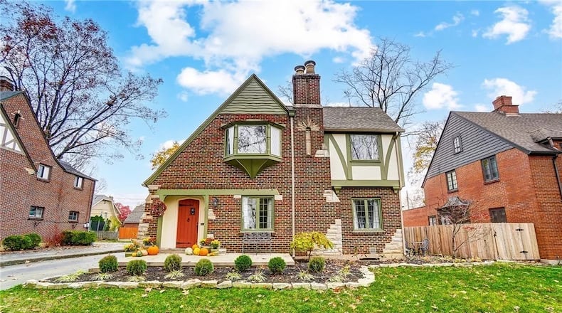 Listed for $575,000 by Sibcy Cline Realtors, this two-story home at 153 Spirea Drive in Oakwood has about 2,663 feet of living space plus a full basement finished to match the Tudor style. CONTRIBUTED