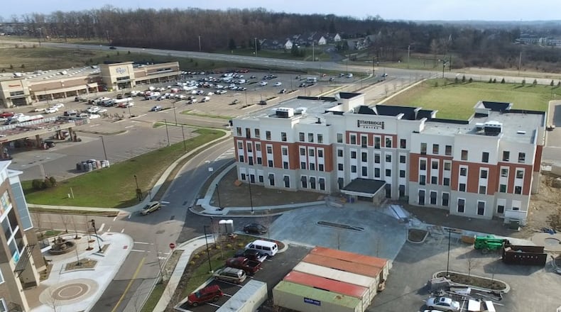The vacant land near the top right of this photo next to Ohio 741 at Austin Landing is involved in a preliminary plan set to go before the Miami Twp. Zoning Commission. TY GREENLEES / STAFF