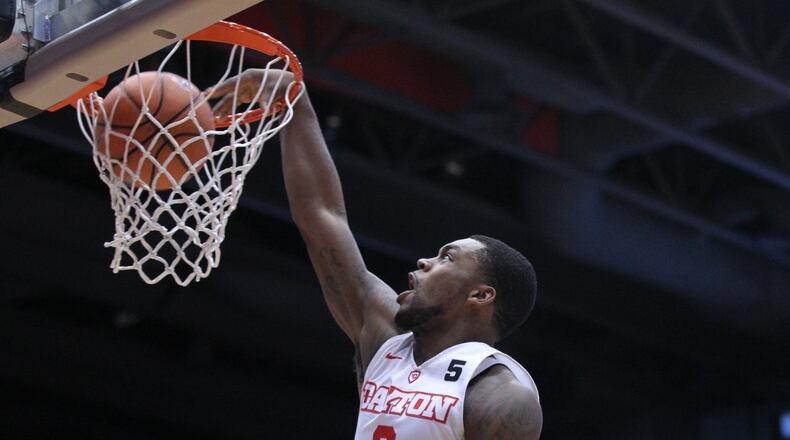 Dayton’s Trey Landers dunks against Rhode Island on Saturday, Jan. 20, 2018, at UD Arena. David Jablonski/Staff