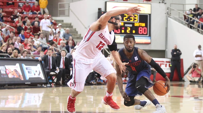 Dayton's Scoochie Smith uses a crossover dribble to create space before making his third 3-pointer in overtime against Davidson on Friday, Feb. 24, 2017, at Belk Arena in Davidson, N.C.