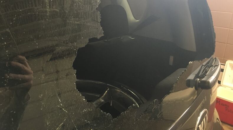 The driver of this car reported a passenger in another car on Interstate 75 Sunday shot out his rear window in a road rage incident in which several shots were fired. FILE