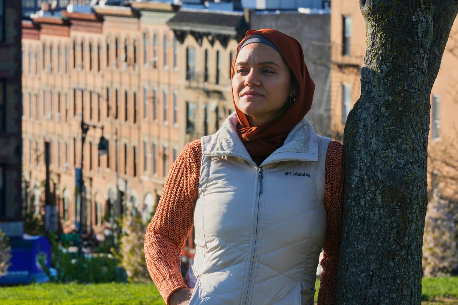 Daniris Espinal stands for a portrait in Sunset Park, in the Brooklyn borough of New York, Thursday, April 17, 2025. (AP Photo/Richard Drew)