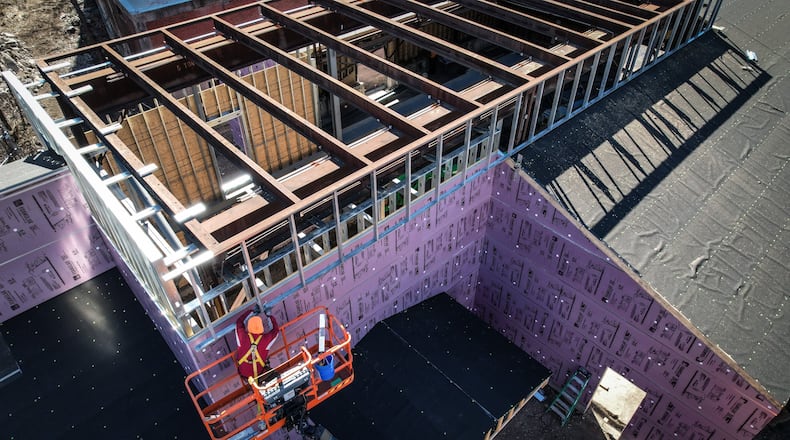 Wes Hartshorn and his two friends/business partners, Shannon Thomas and Scott Johnson, are in the midst of redeveloping 1.5 acres near 2nd Street Market in downtown Dayton into The Silos, a food hall and beer garden with 13,000-square-feet of outdoor space. JIM NOELKER/STAFF