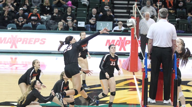 Versailles’ Lindsey Winner spikes the ball against Tuscarawas Valley in a Division III state volleyball semifinal on Thursday, Nov. 8, 2018, at the Nutter Center in Fairborn. David Jablonski/Staff