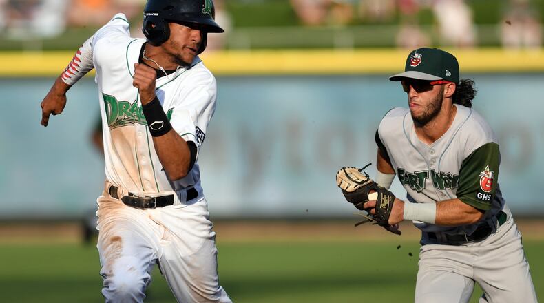 Jose Siri gets in a rundown during the Dragons’ game against Fort Wayne on Saturday night at Fifth Third Field. Siri homered twice in an 8-1 win. NICK FALZERANO / CONTRIBUTED