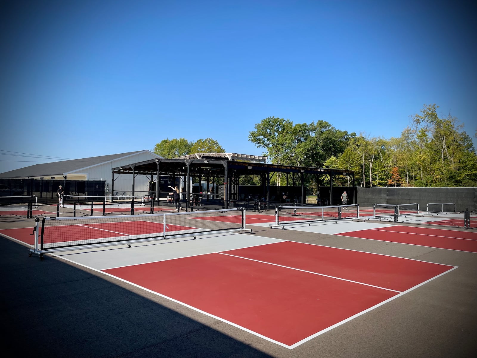 Long’s Sideout Sports & Spirits, a new recreation facility featuring six pickleball courts and a bar, is located at 1395 U.S. 42 S. in Xenia. NATALIE JONES/STAFF