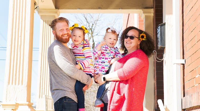 Akilah and Joe Biederman and their daughters, Eshe, 4, and Amina, 2, recently stepped onto their porch for a photo session with Jamie Cox who is participating in the Front Porch Project. JAMIE COX / J RENEE CREATIONS PHOTOGRAPHY