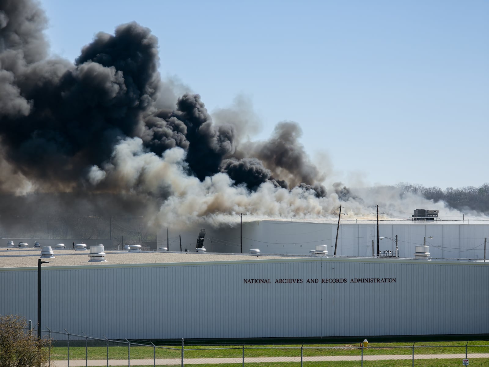 The fire at Fuyao Glass America rekindled shortly before noon on Tuesday, March 24. While firefighters have been working at the site since it first caught fire Sunday night, they had been focusing on hotspots before a large rekindling caused black smoke to rise that was visible for miles. The building that caught fire was Fuyao's coating facility, which was still in the finishing stages of construction. BRYANT BILLING / STAFF