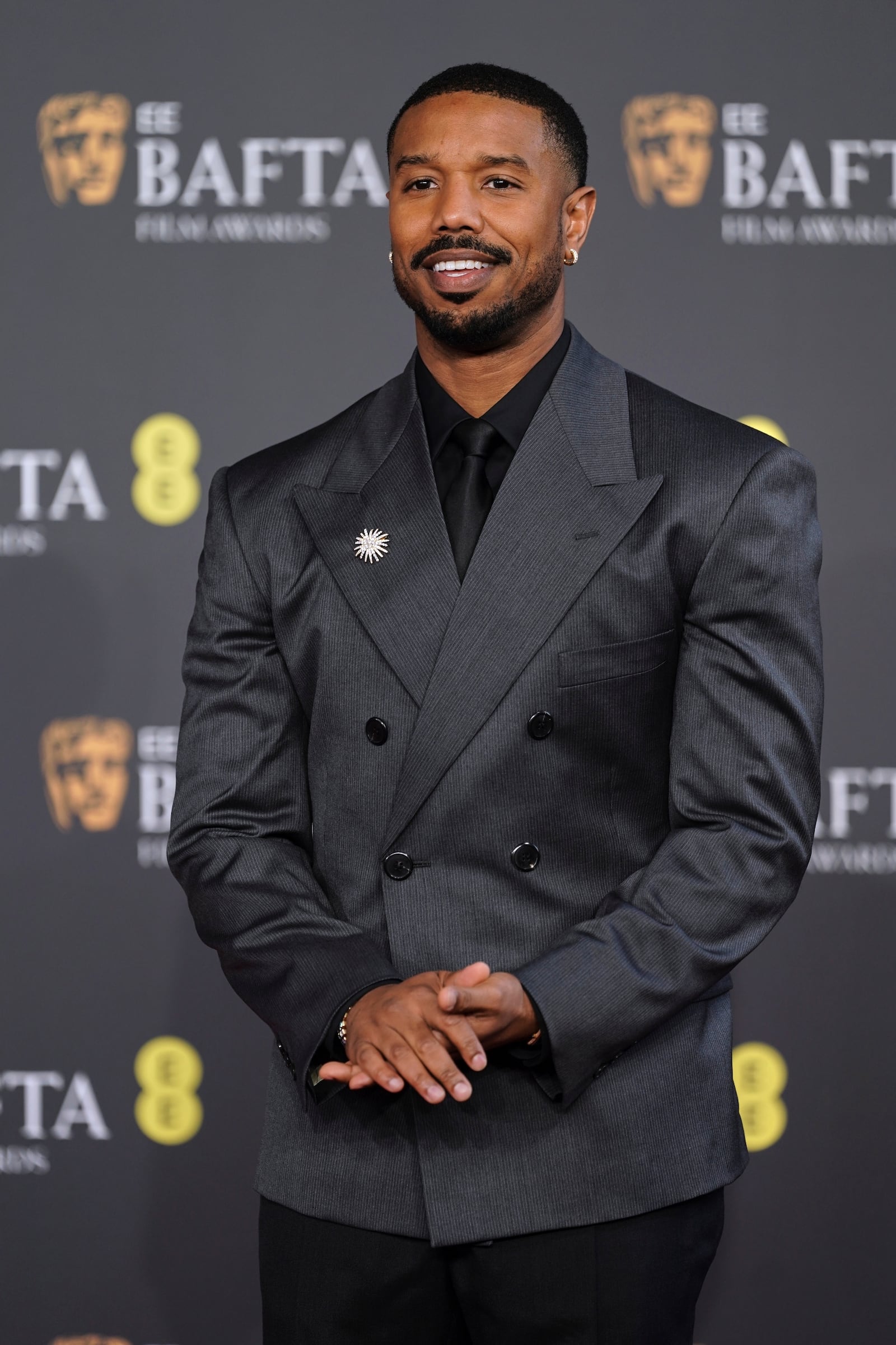 Michael B. Jordan poses for photographers upon arrival at the 79th British Academy Film Awards, BAFTA's, in London, Sunday, Feb. 22, 2026. (AP Photo/Alberto Pezzali)