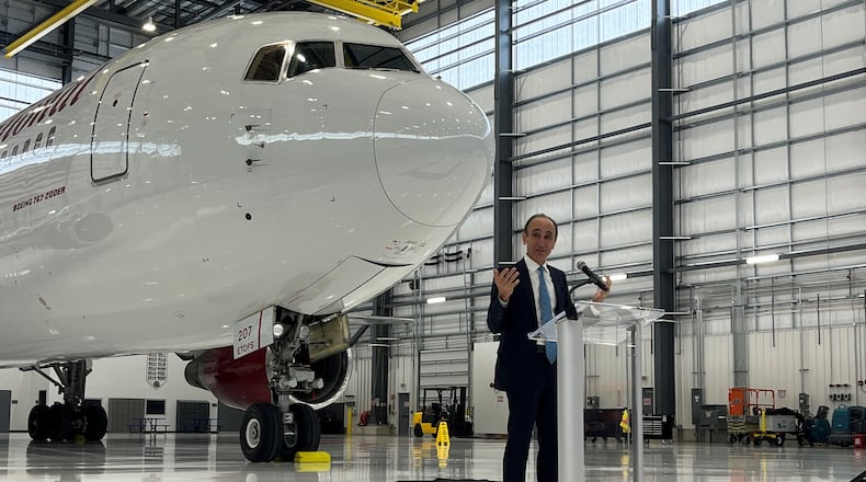 Faith Ozmen, CEO and co-owner of Sierra Nevada Corp., speaks at a ribbon-cutting event for a new maintenance, repair and overhaul facility at the Dayton International Airport on Wednesday, Feb. 8, 2023. Sierra Nevada has built and opened a second local MRO facility and is working to open two more. CORNELIUS FROLIK / STAFF