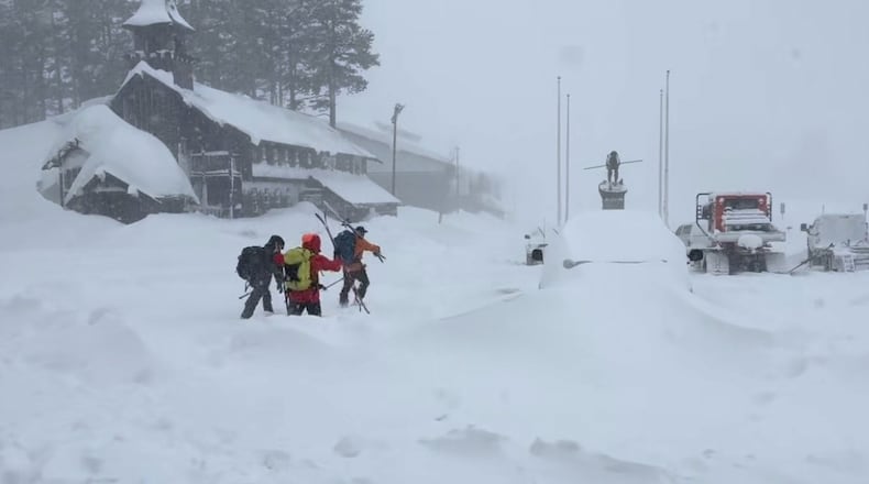 This image provided by the Nevada County Sheriff's Office shows members of a rescue team in Soda Springs, California on Tuesday, Feb. 17, 2026. (Nevada County Sheriff's Office via AP)
