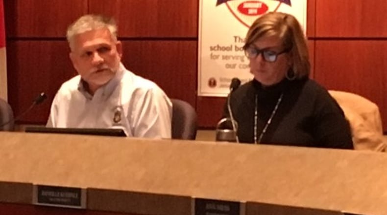 Miamisburg Board of Education President Dale Toadvine, seen here with Vice President Danielle Kuehnle, said racial incidents at Miamisburg Middle School “will be addressed.” NICK BLIZZARD/STAFF