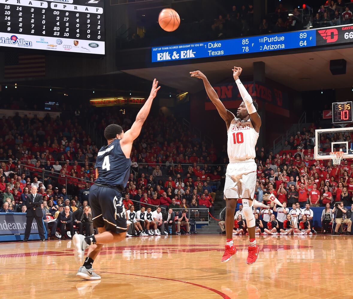 PHOTOS: Dayton rallies to beat Akron