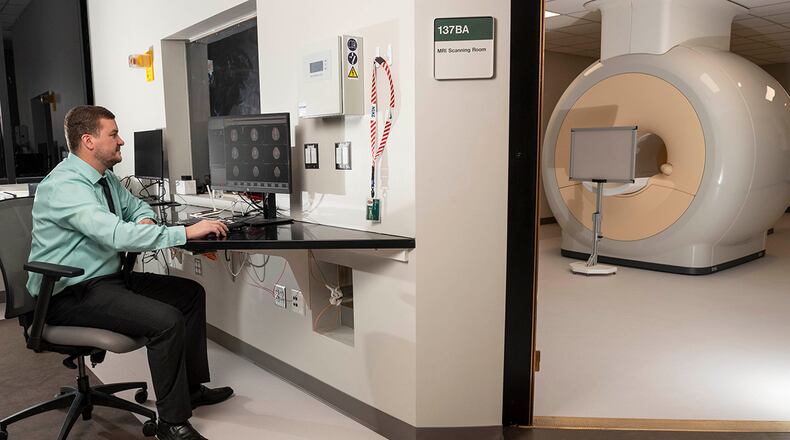 Matthew Sherwood, director of Wright State’s Center of Neuroimaging and Neuro-Evaluation of Cognitive Technologies, says a new MRI scanner promises to lead to new collaboration between Wright State, the Air Force and researchers at Wright-Patterson Air Force Base. CONTRIBUTED