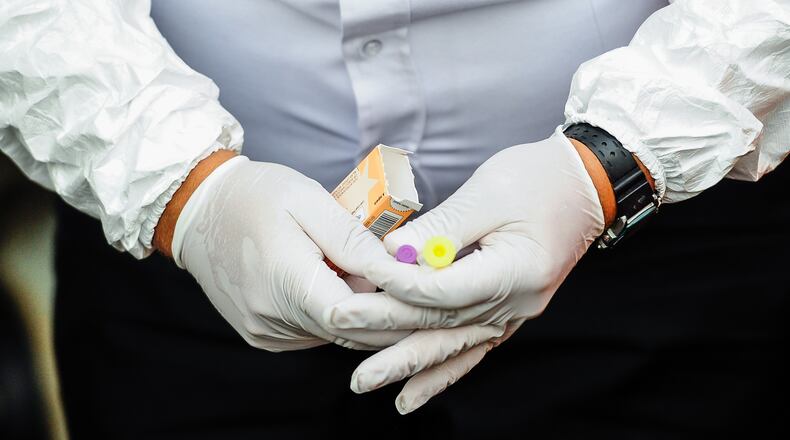 For the past two years, Middletown has implemented a multi-prong approach to the heroin epidemic that includes: a Quick Response Team that sends a police officer, firefighter/paramedic and social worker to see if someone who overdosed is interesting in treatment; a needle exchange program; and changes in law enforcement. NICK GRAHAM/STAFF