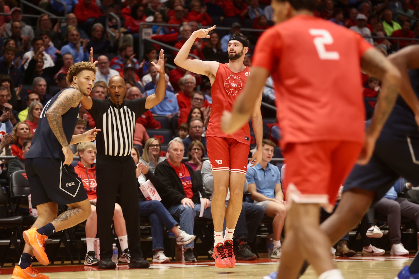 Dayton's Jacob Conner celebrates after making a 3-pointer against Penn State in an exhibition game on Sunday, Oct. 19, 2025, at UD Arena. David Jablonski/Staff