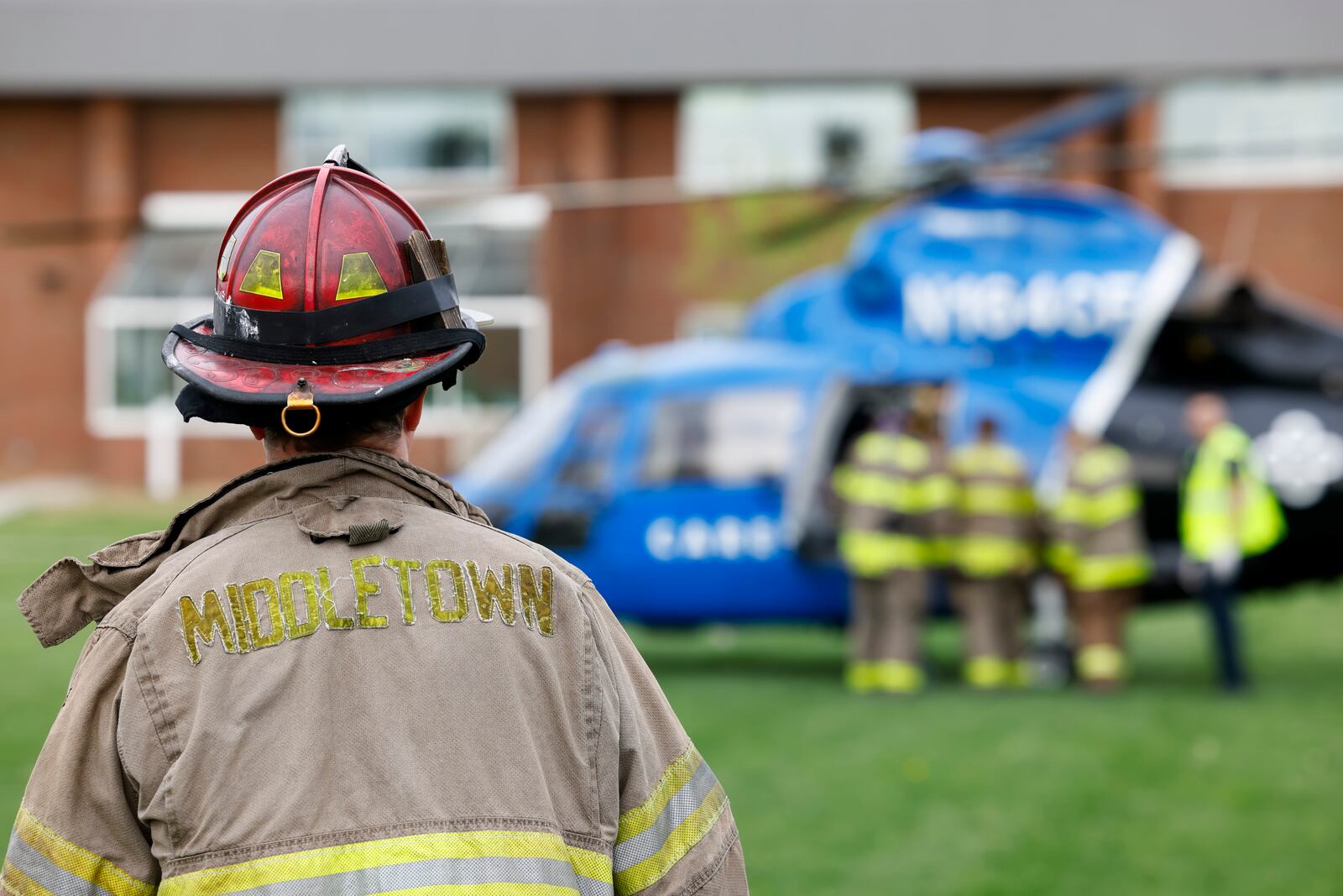 A mock crash was held at Middletown High School Friday, April 21, 2023. Middletown Police and Fire departments, Ohio State Highway Patrol, Premier Health's Careflight helicopter, Wilson-Schramm-Spaulding Funeral Home and others to helped students visualize the possible impact of distracted or impaired driving. NICK GRAHAM/STAFF