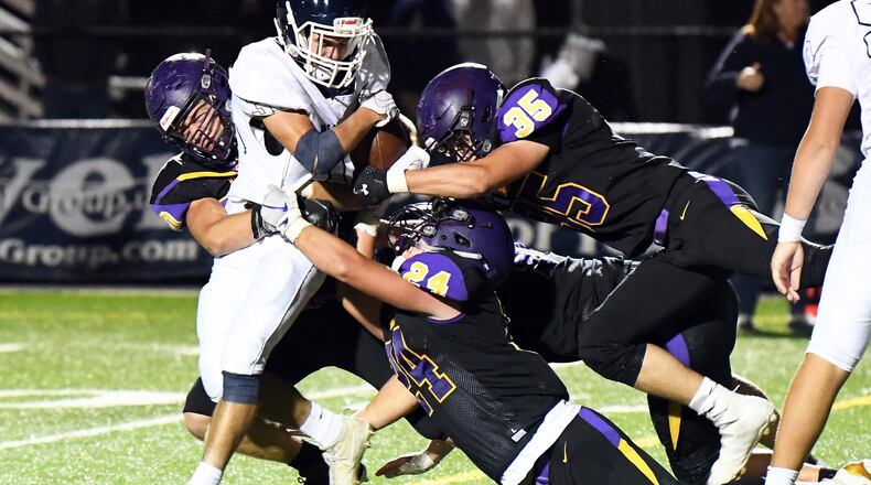 The Bellbrook defense stuffs a Valley View runner during Friday night’s game at Bellbrook. Nick Falzerano/CONTRIBUTED