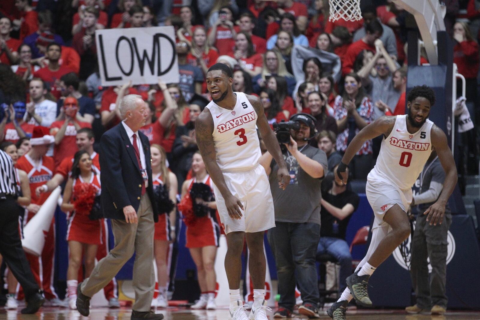 Dayton’s Trey Landers and Josh Cunningham react after a victory against Georgia State on Saturday, Dec. 16, 2017, at UD Arena. David Jablonski/Staff