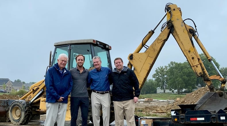 The Simms family has had multiple generations of homebuilders. From left, the late Charles V. Simms, Crosby Simms, Charlie Simms and Robi Simms. Charlie bought his dad's homebuilding company in 1996. His sons, Crosby and Robi, bought the company from him in 2024. CONTRIBUTED