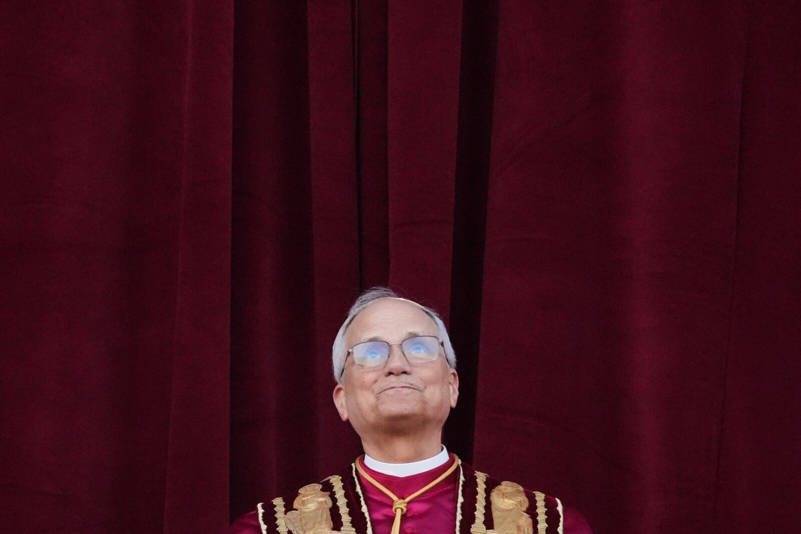Newly elected Pope Leo XIV appears at the balcony of St. Peter's Basilica at the Vatican, Thursday, May 8, 2025. (AP Photo/Alessandra Tarantino)