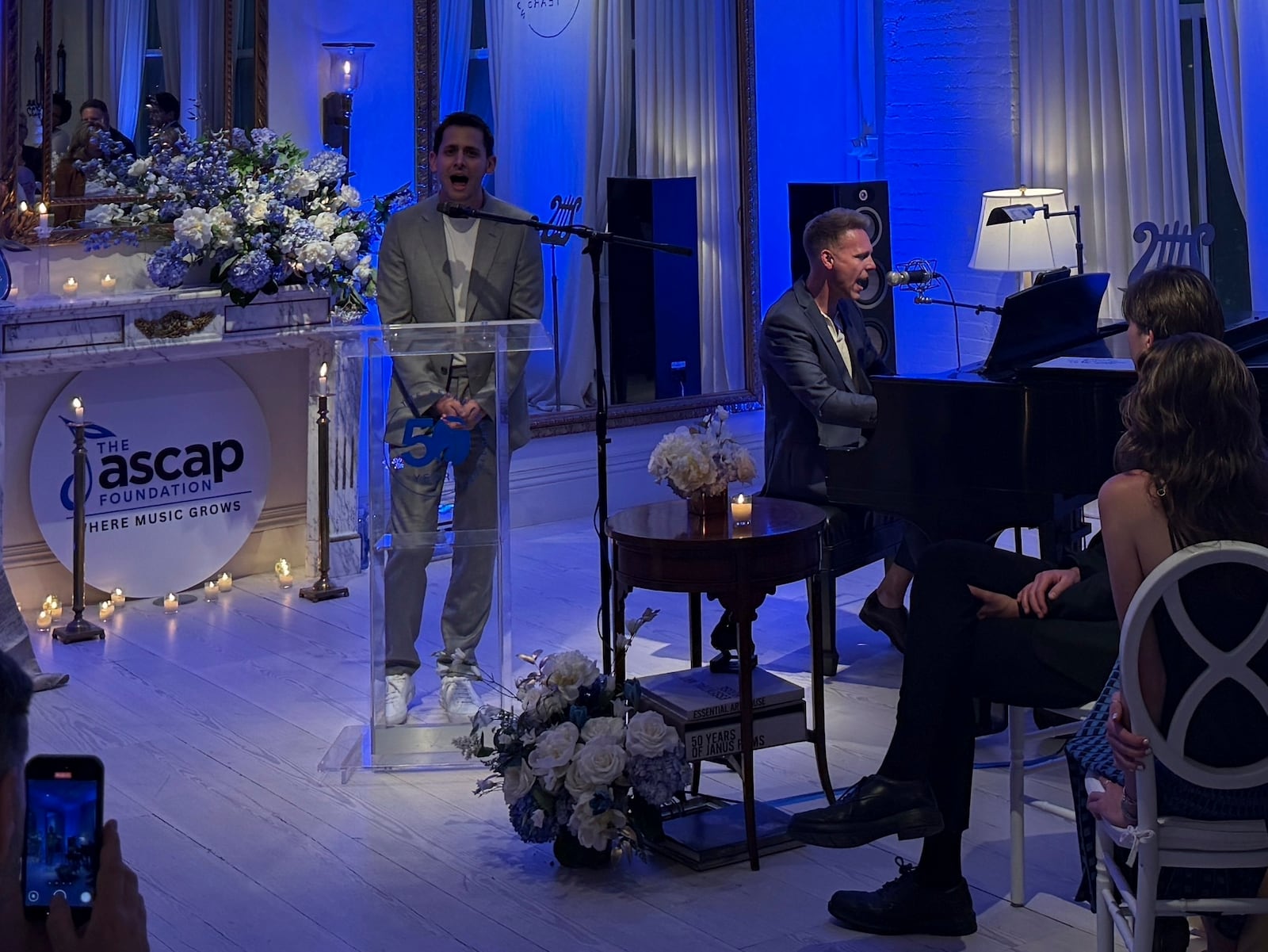 Justin Paul, right, and Benj Pasek perform the song Morning Glow from the musical Pippin at the ASCAP Foundation's 50th anniversary celebration in Manhattan, New York on Tuesday, June 10, 2025. (AP Photo/James Pollard)