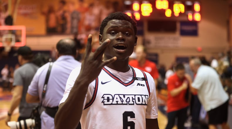 Dayton's Enoch Cheeks celebrates after a victory against Connecticut in the Maui Invitational on Wednesday, Nov. 27, 2024, at the Lahaina Civic Center. David Jablonski/Staff
